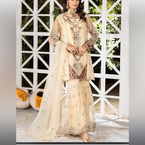 3 piece net sharara outfit with shirt, sharara and duputta.